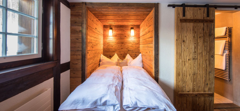Luxury Switzerland Holiday Packages Guarda Val Cuddle Room Bedroom 2