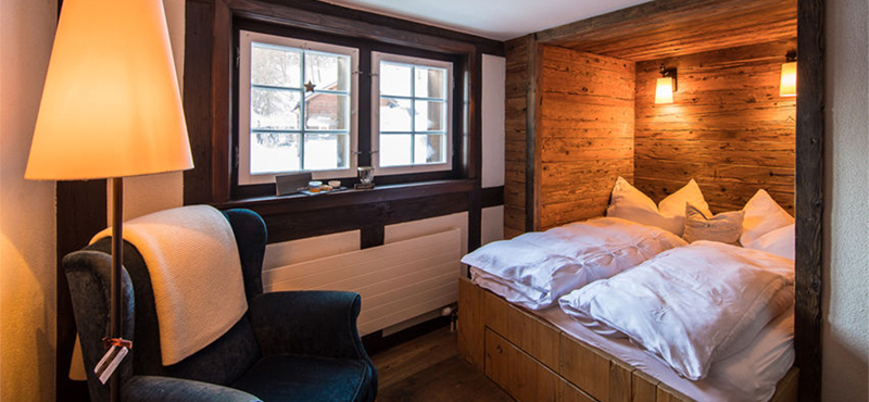Luxury Switzerland Holiday Packages Guarda Val Cuddle Room Bedroom