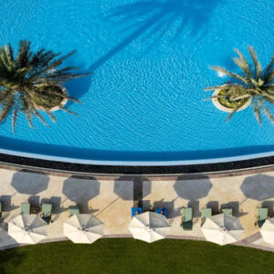 Luxury Dubai Holiday Packages Raffles The Palm Dubai Aerial View Of Pool1